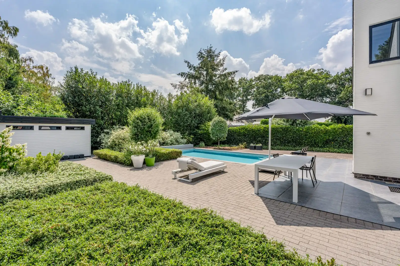 Moderne architectenwoning met mooie tuin en zwembad, 5 slaapkamers in Hasselt, OB op 8a12ca in doodlopende straat foto 7