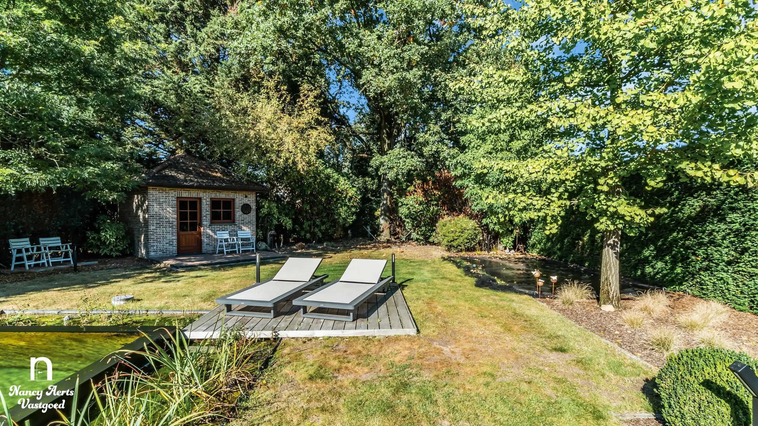 Karaktervolle villa met natuurzwembad en poolhouse in Genk foto 26