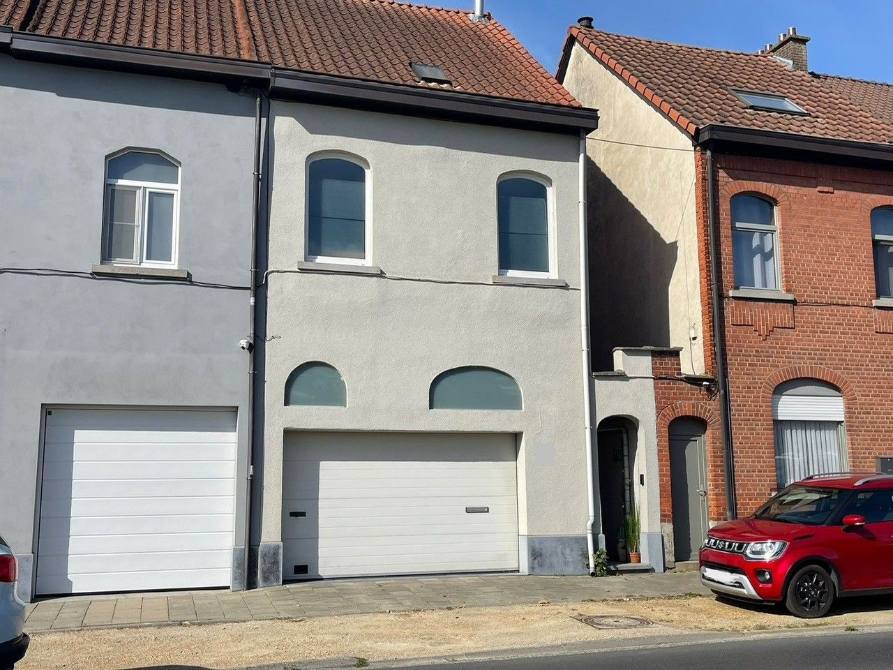 Woning met inpandige garage en tuin foto {{pictureIndex}}