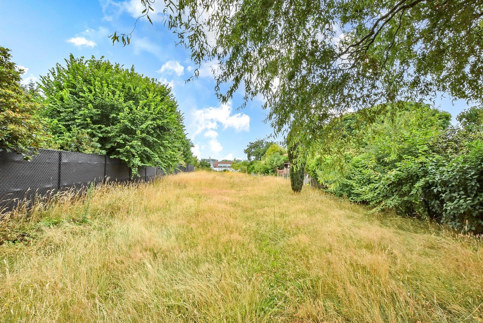 Halfopen bebouwing met mogelijkheid tot 7 slaapkamers, 2 badkamers en grote tuin in Aalter foto 2