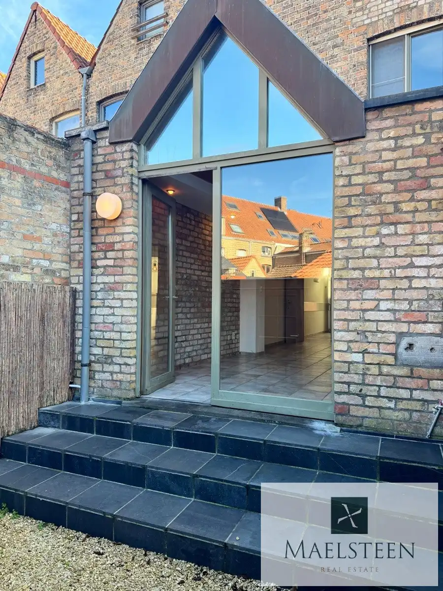 Instapklare trapgevelwoning, gelegen in Brugge centrum foto 8