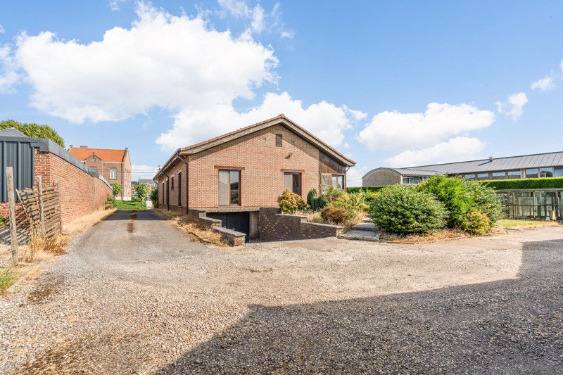 Gelijkvloerse woning met grote loods achteraan op 25are foto 45