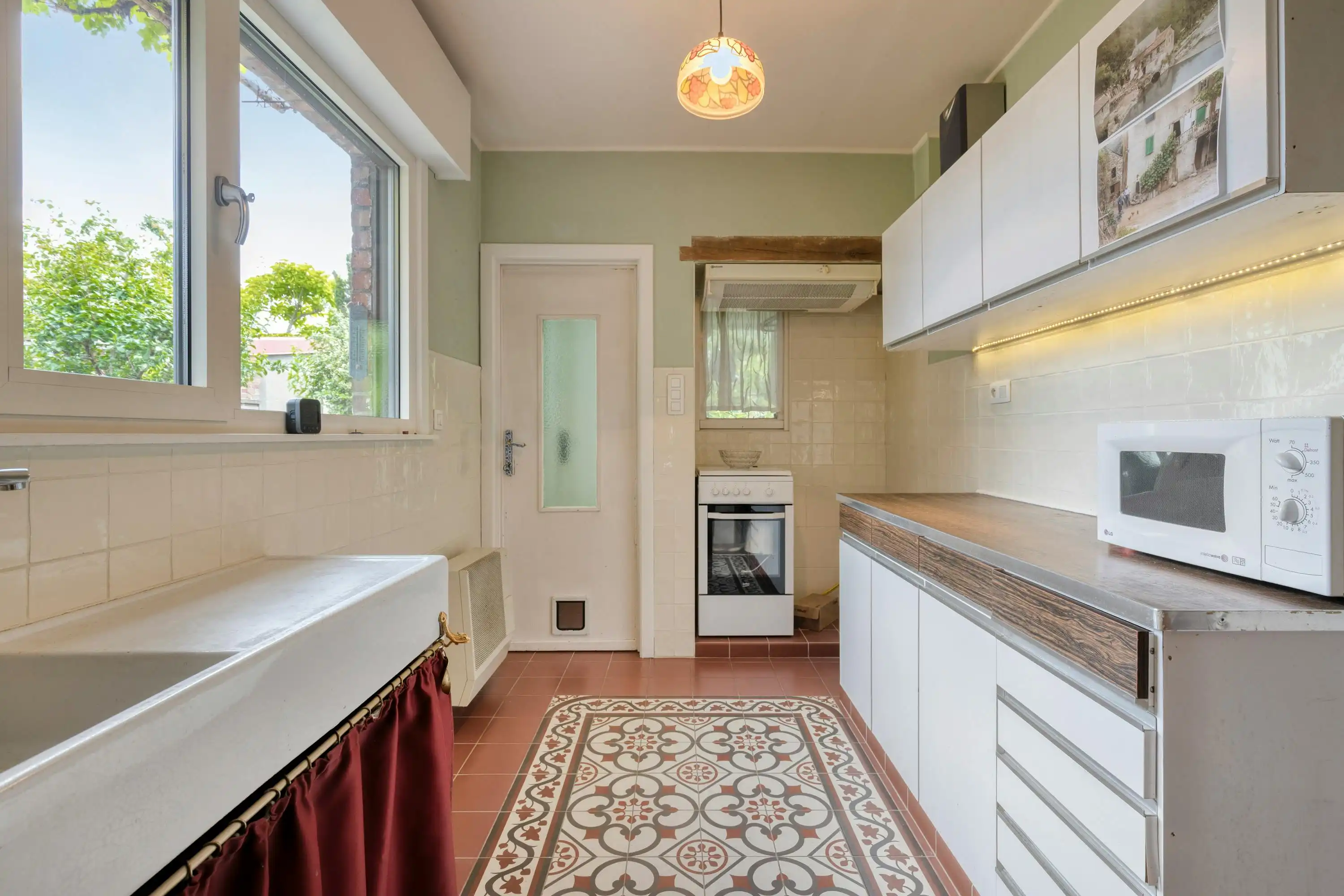 Halfopen huis met 3 slaapkamers, carport + tuin te Sint-Kruis foto 8