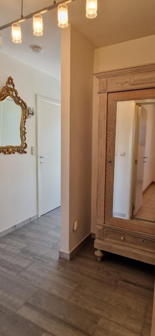 Zonnig APPARTEMENT, hob., 2de.verd., met mooie leefruimten, 2 slpkmrs, aparte kelder en ondergrondse autostaanplaats,  foto 4