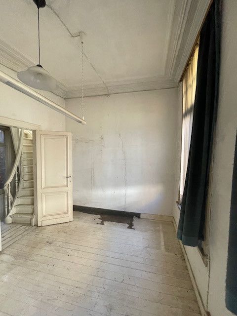 Volledig te renoveren rijwoning met karakter in hartje Borgerhout! foto 5