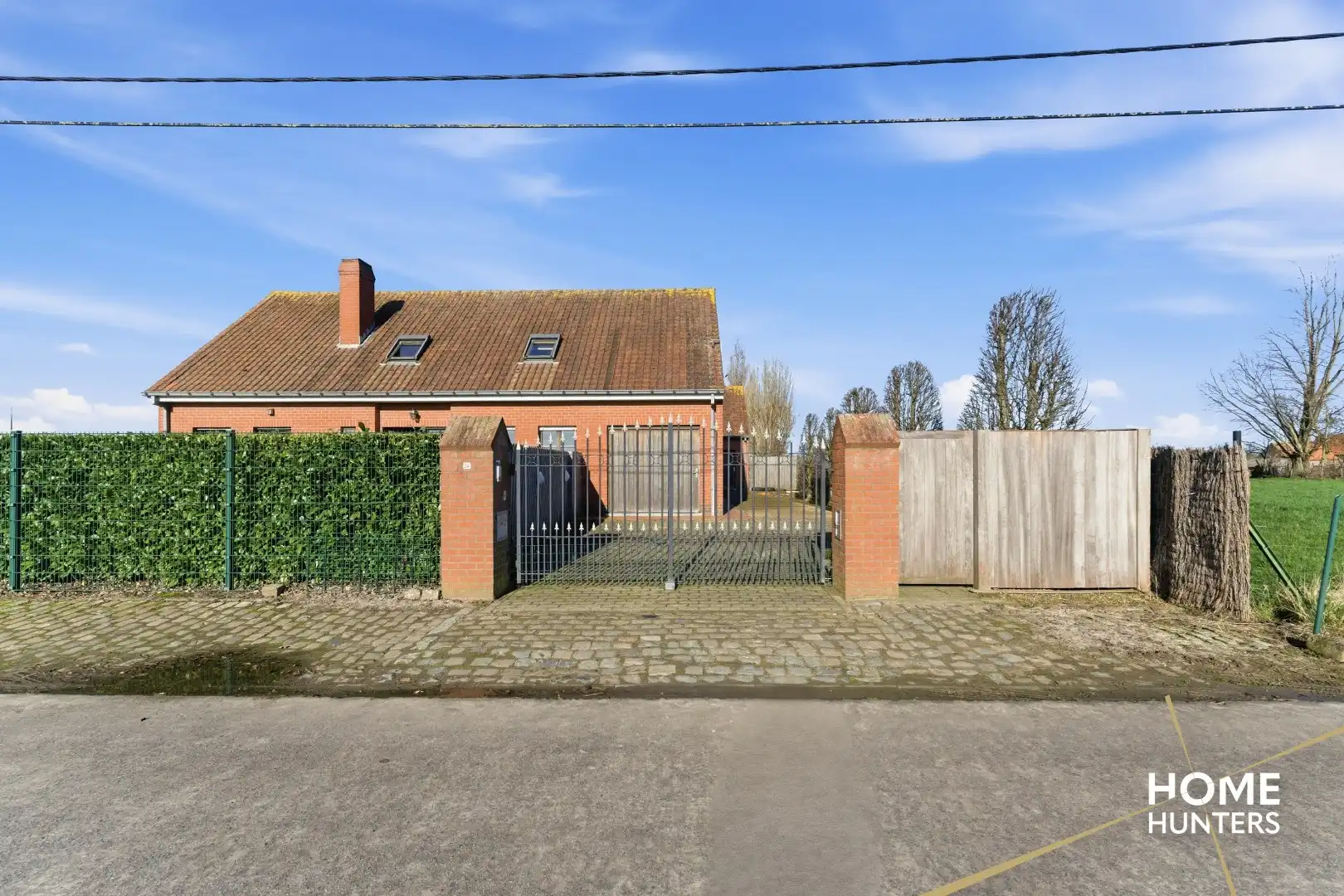 Landelijke villa met bijgebouw en weide op 4.700 m² in Boezinge foto 4