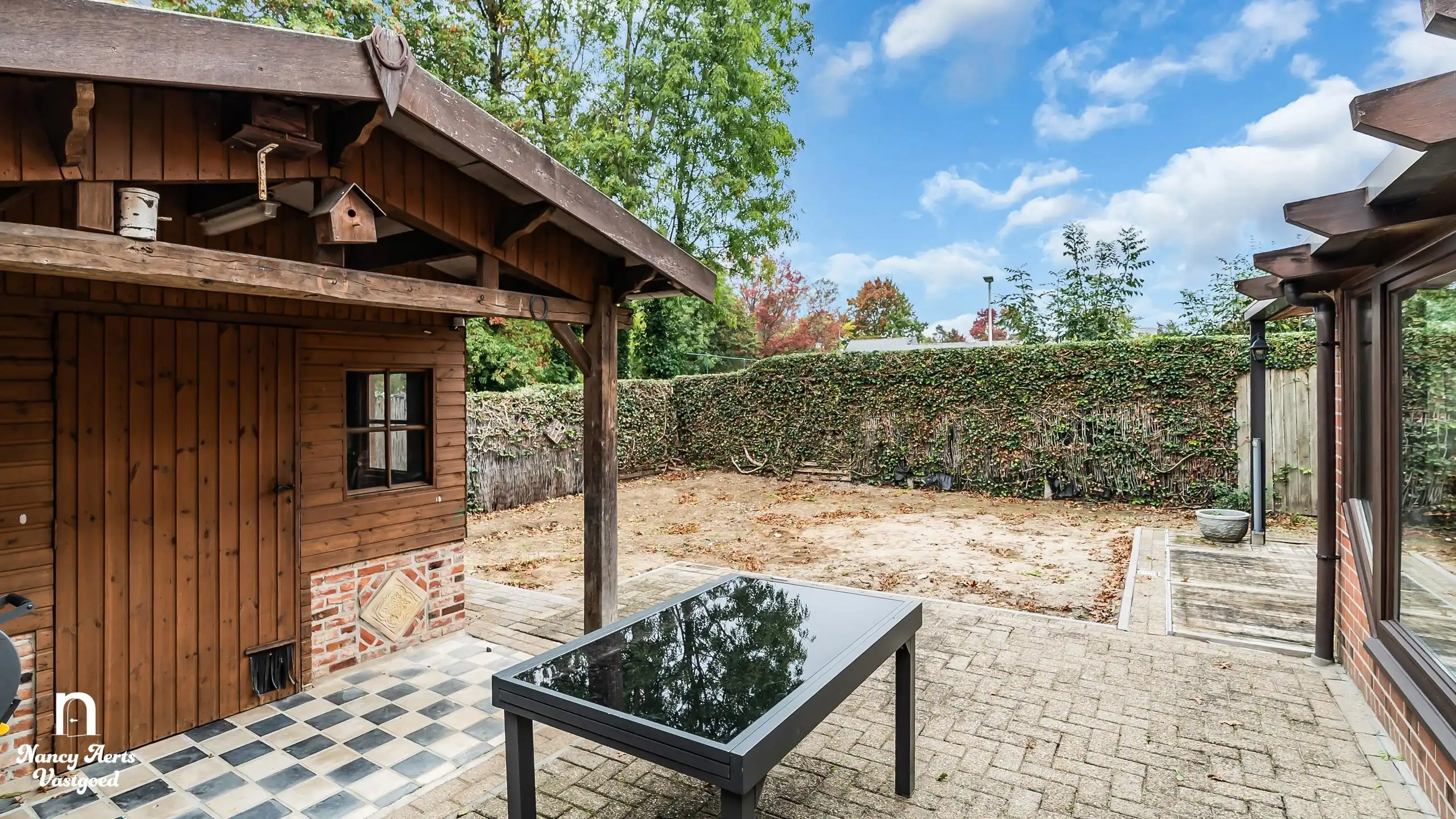 Halfopen gezinswoning met 3 slaapkamers en zonnige tuin foto 23
