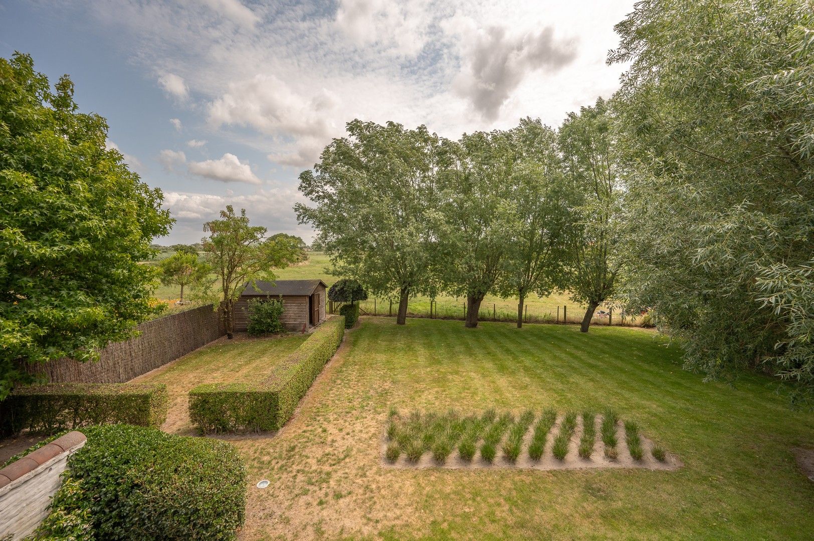 Alleenstaande villa genietend van prachtige open zichten op de polders. foto 11