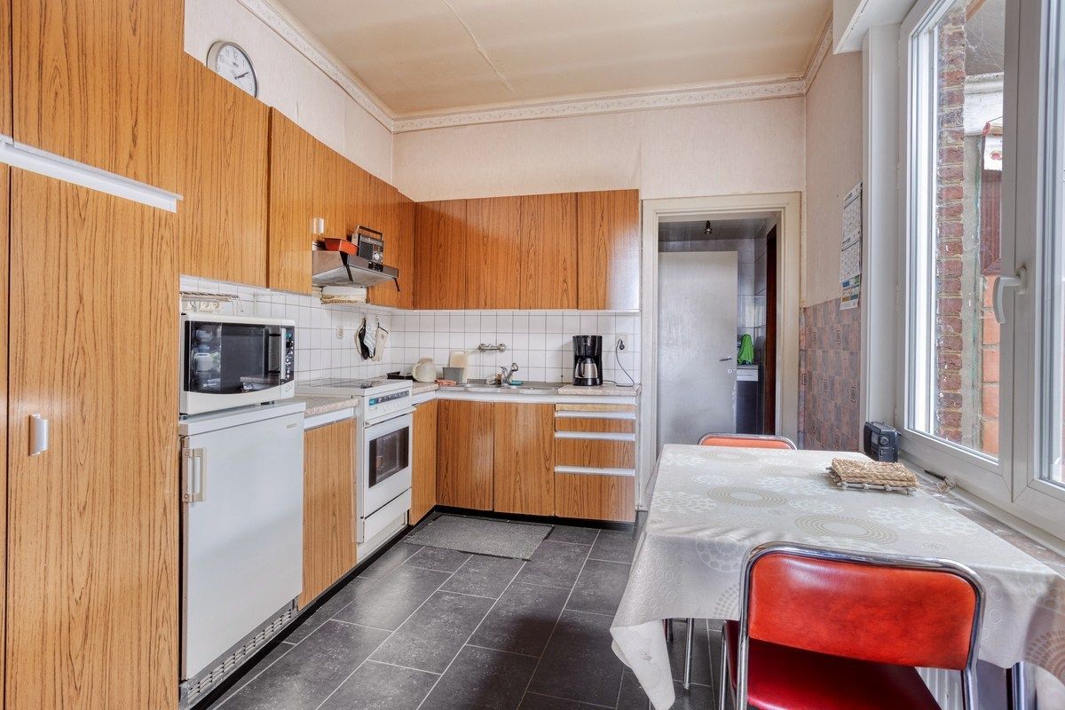Te renoveren woning en 2 bouwgronden foto 5