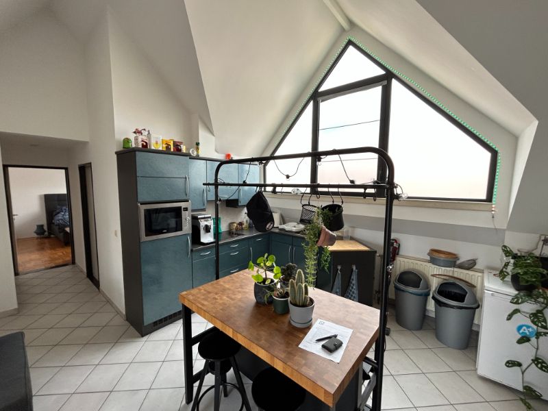 Prachtig 1 slpk dakappartement met terras (±40m²), garage en lift. foto 5