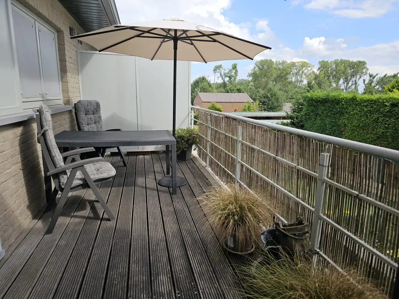 Duplex appartement met ruim terras en carport/berging foto 9