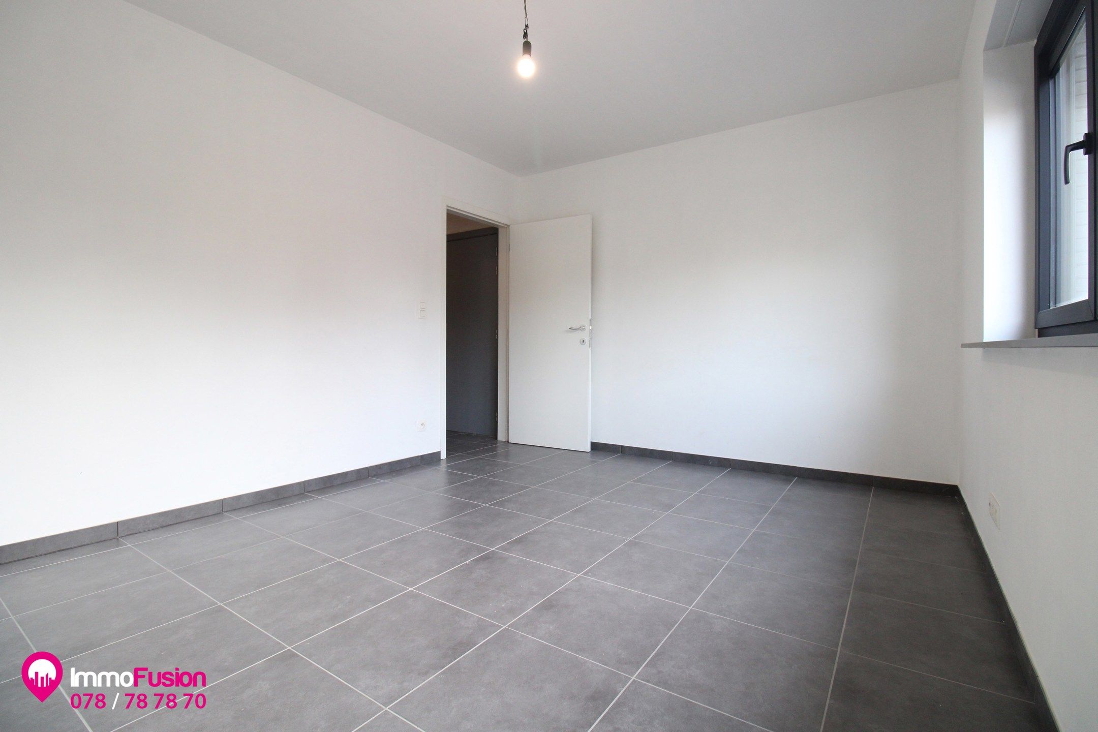 Mooi appartement te huur in centrum Zolder met 2 slaapkamers! foto 7