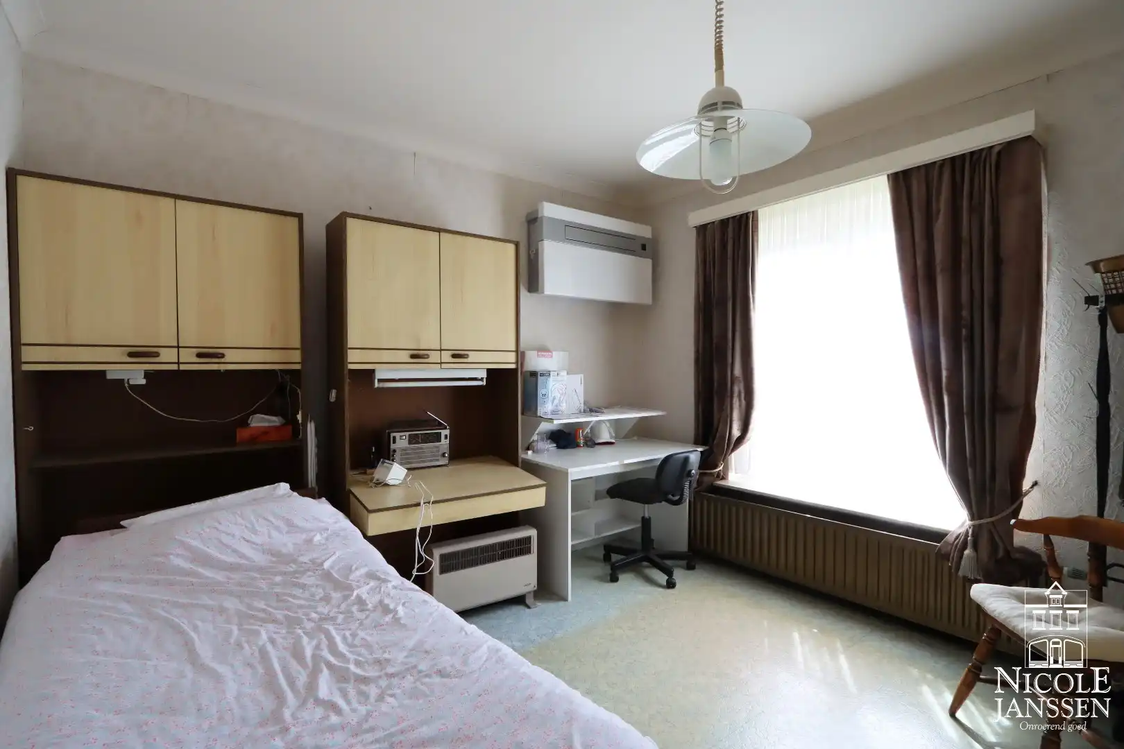 Gelijkvloerse gezinswoning met drie slaapkamers, grote kelder en ruime tuin foto 13