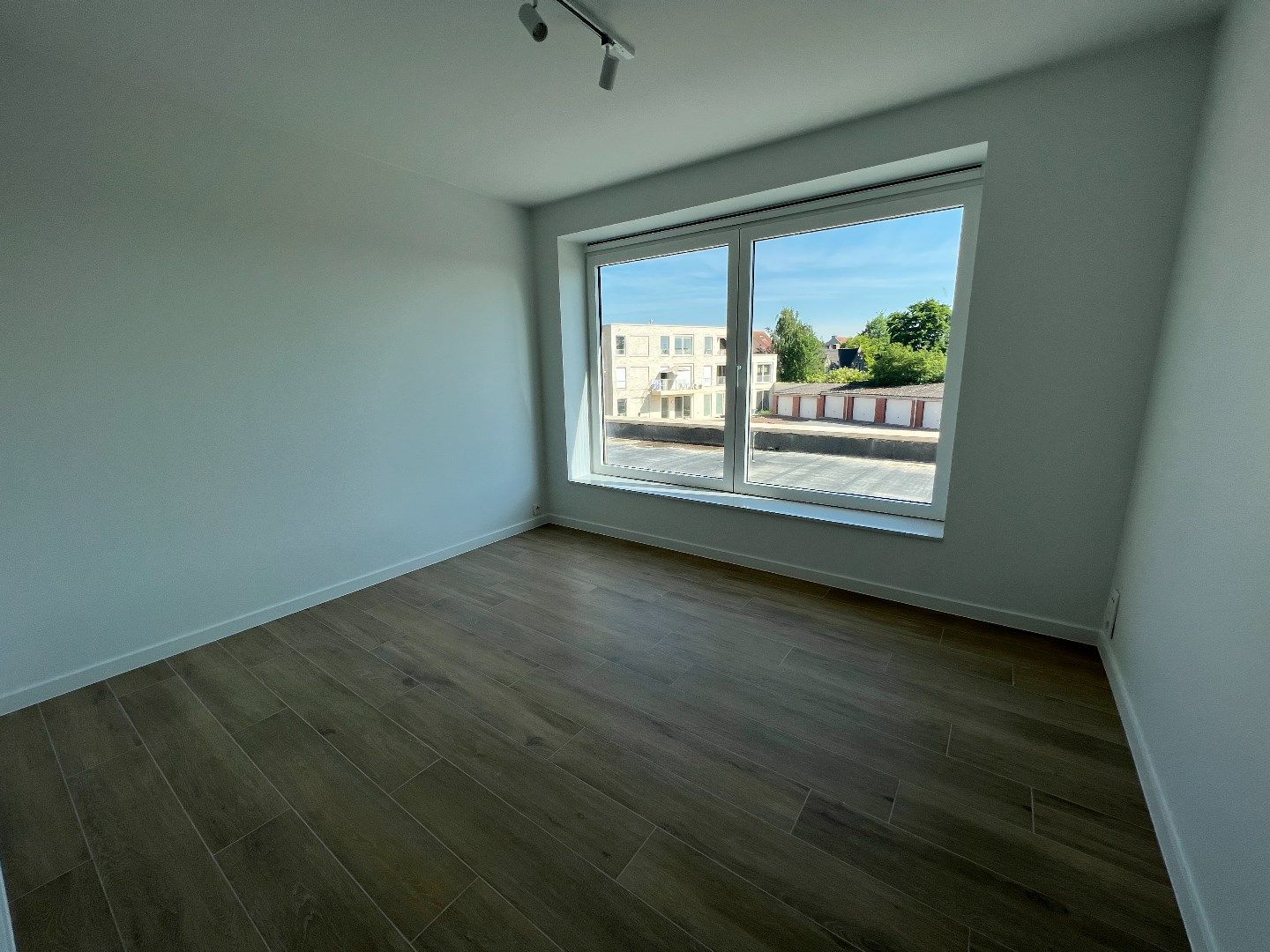 NIEUWBOUWAPPARTEMENT MET 2 SLAAPKAMERS, TERRAS EN CARPORT IN IEPER foto 12