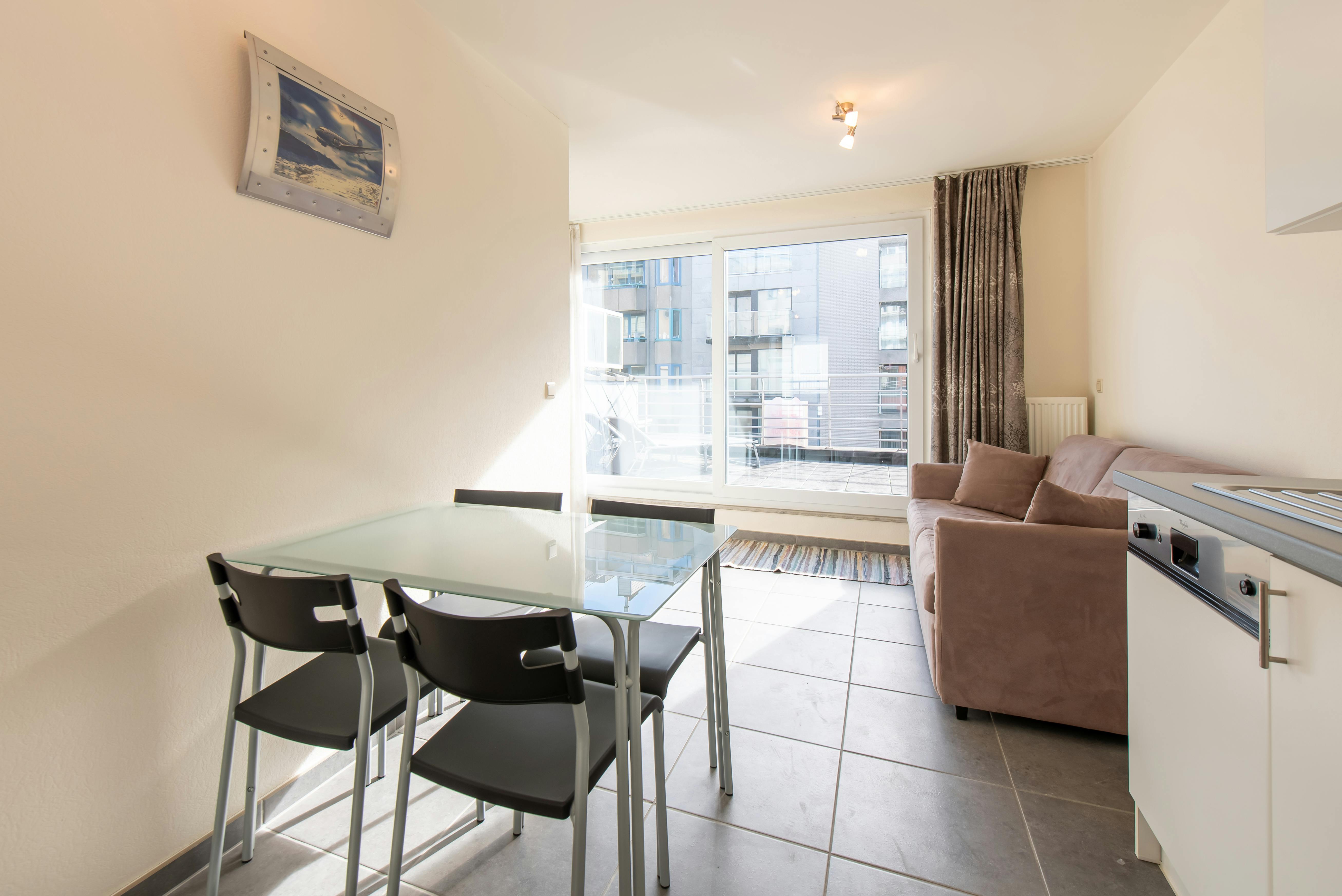 Zuidgerichte penthouse studio met ruime terrassen op topligging! foto 9