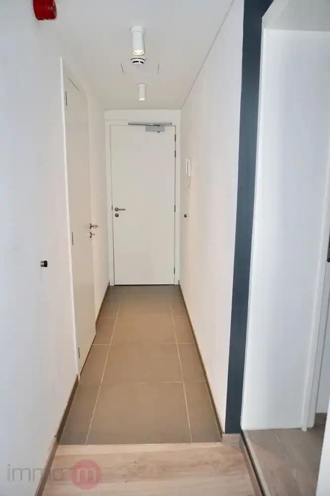 Recent appartement met terras en 1 slaapkamer te huur in hartje Leuven foto 12