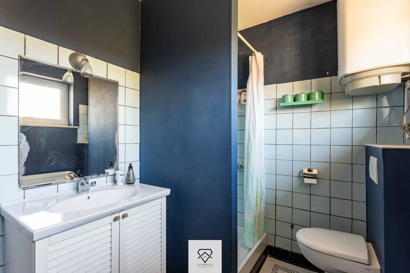 Gezinswoning met tuin en veel potentieel in het gegeerde Oostakker foto 22