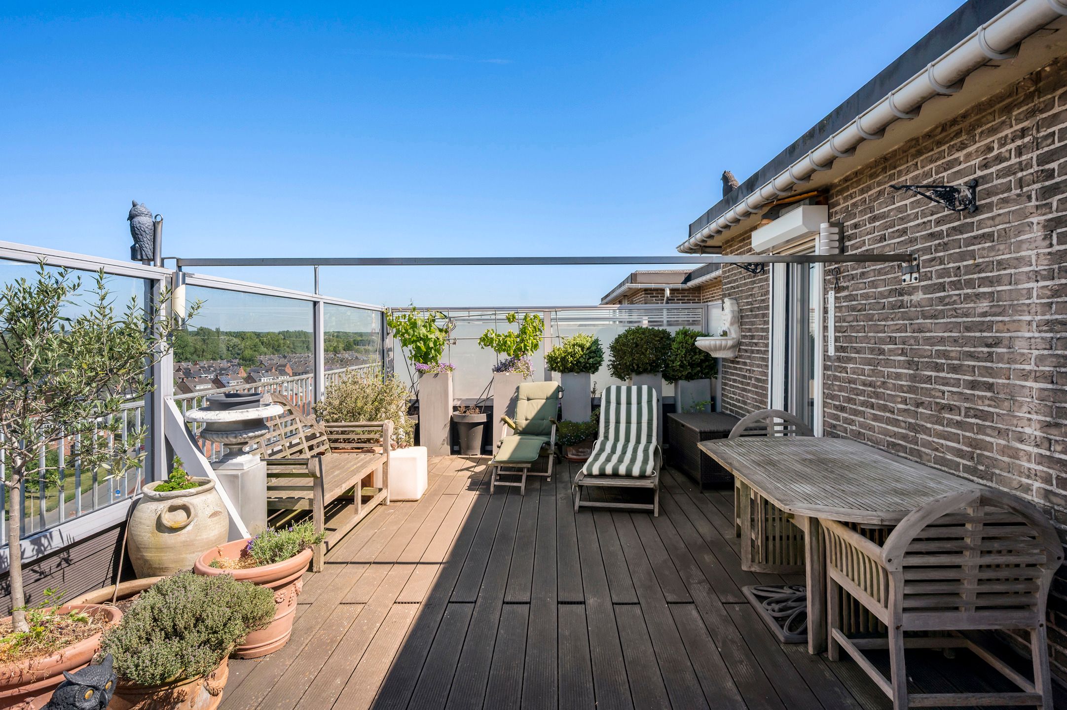 Appartement met prachtig zicht vanaf het privé-dakterras! foto 11
