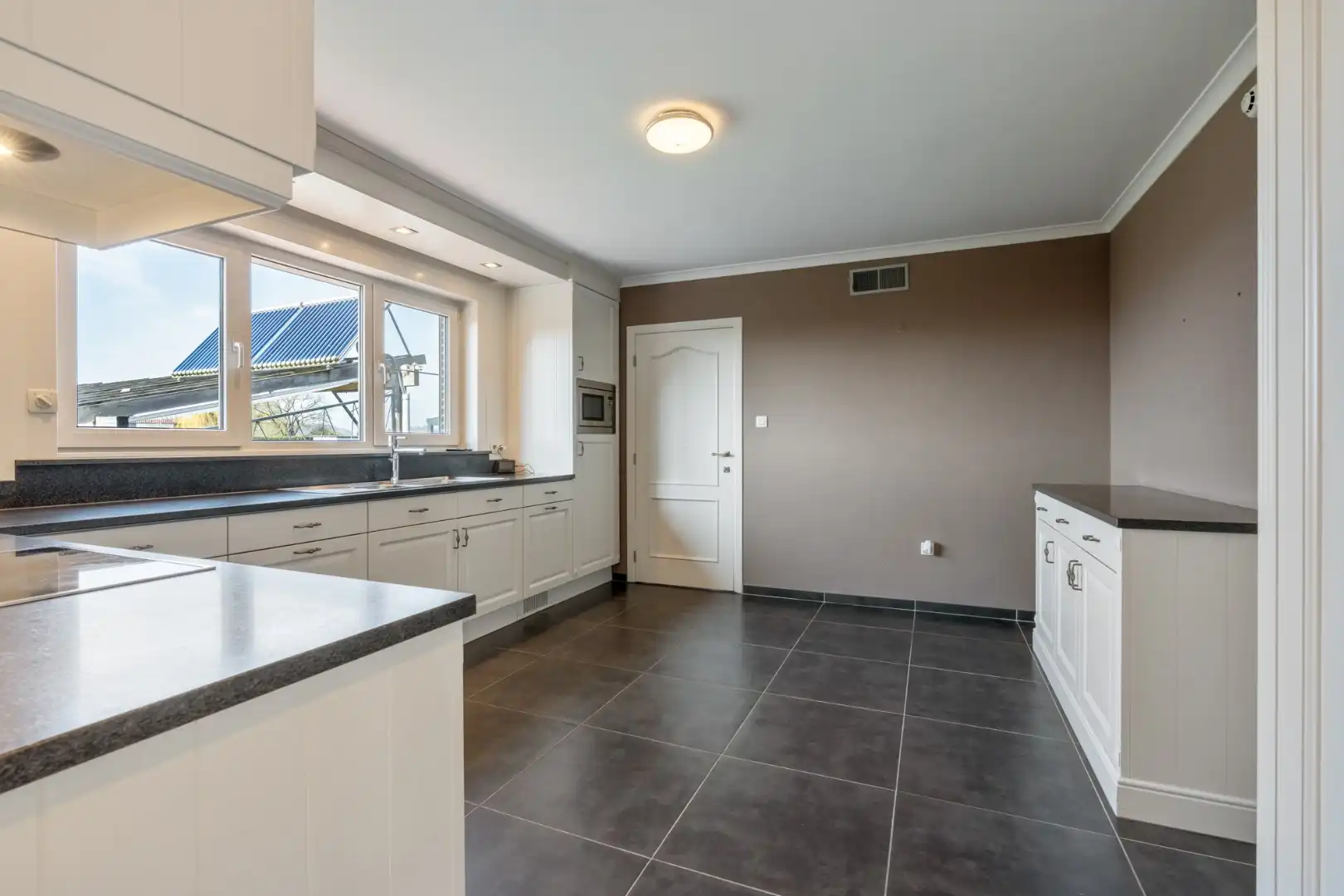 Comfortabele woning met sterke energieprestatie (label A), in landelijk woongebied. foto 25