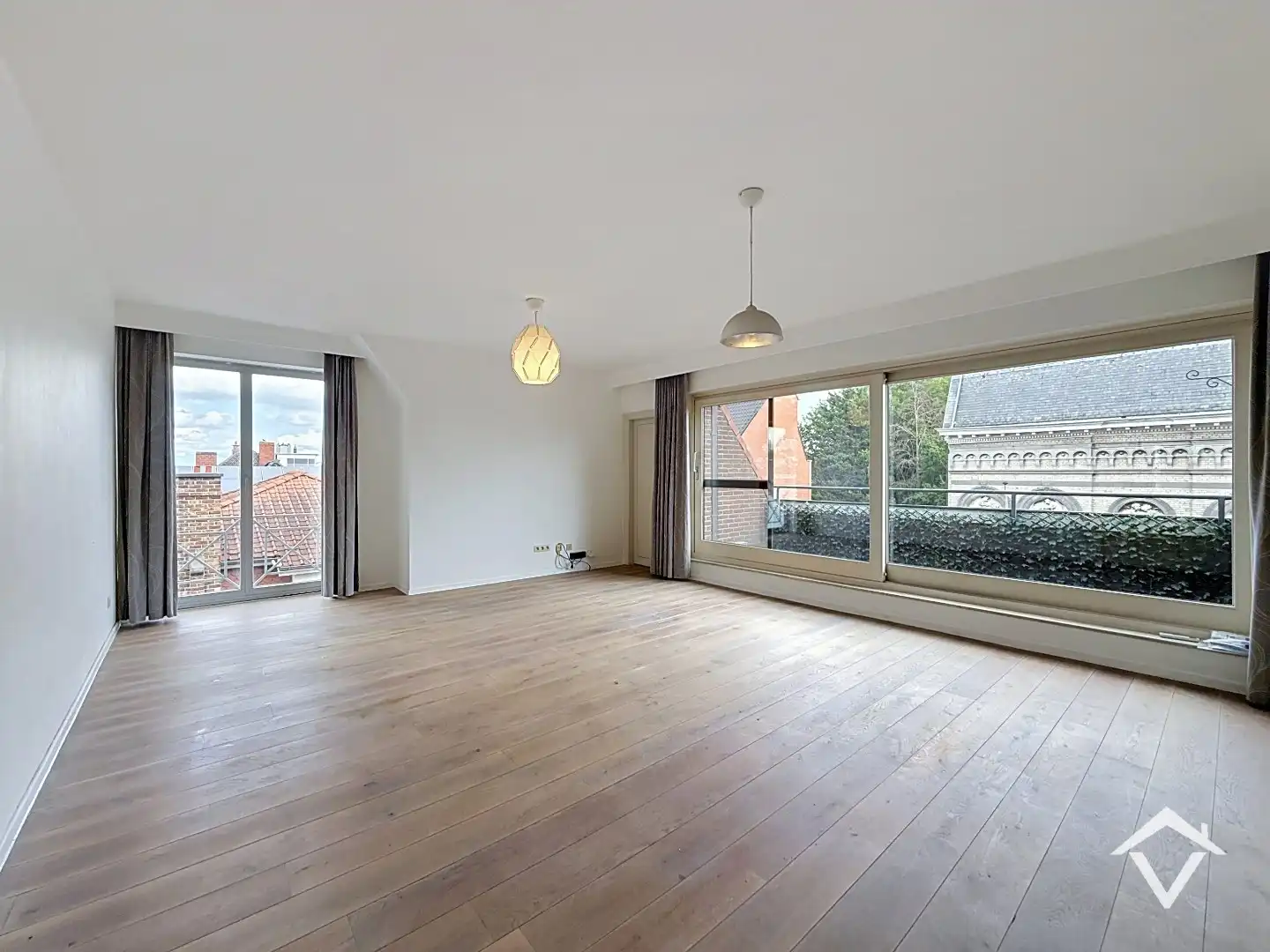 Ruim, gezellig dakappartement met 3 slaapkamers in centrum Roeselare  foto 4