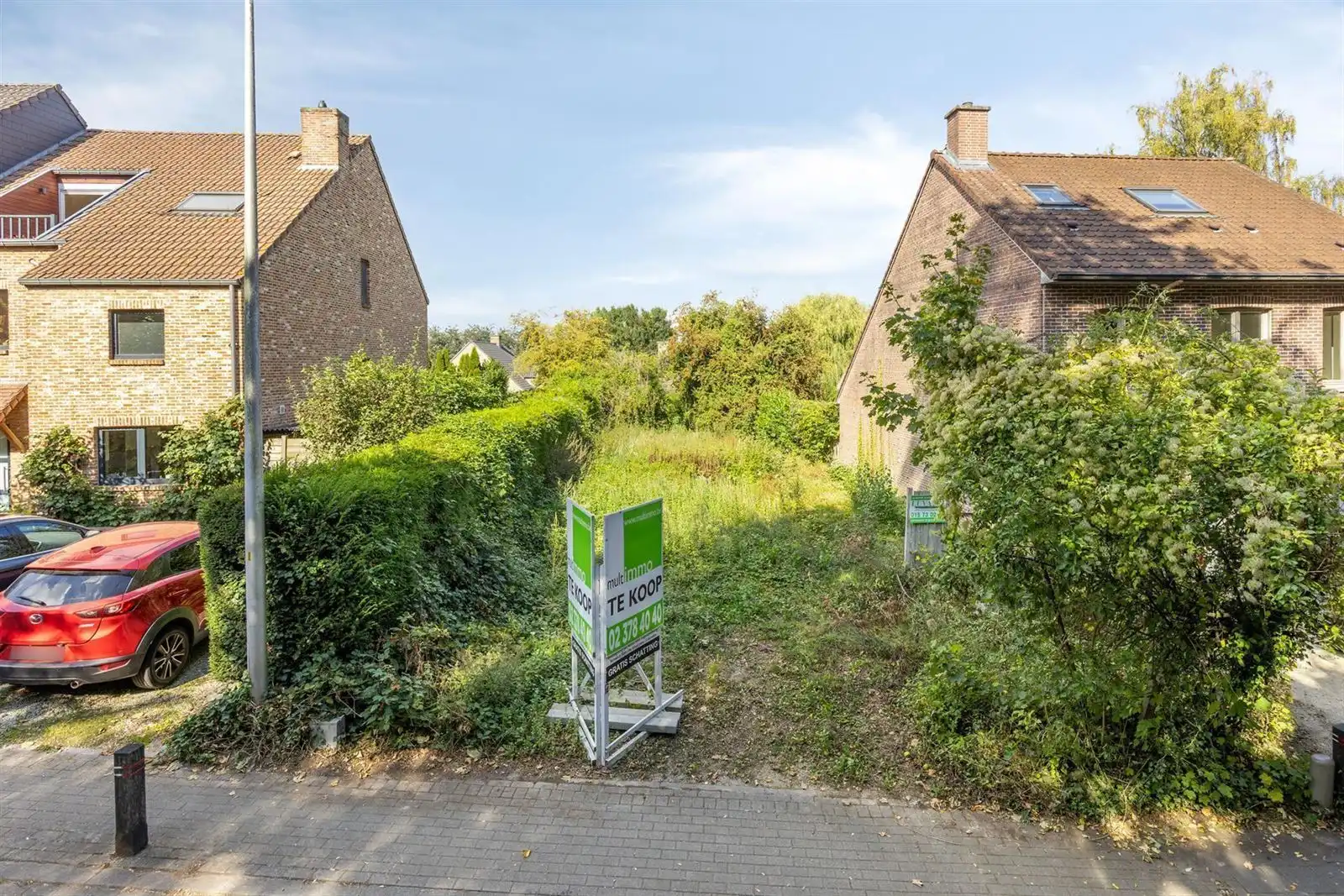 Goed gelegen bouwgrond (4a 40ca) voor een 3-gevelwoning foto {{pictureIndex}}