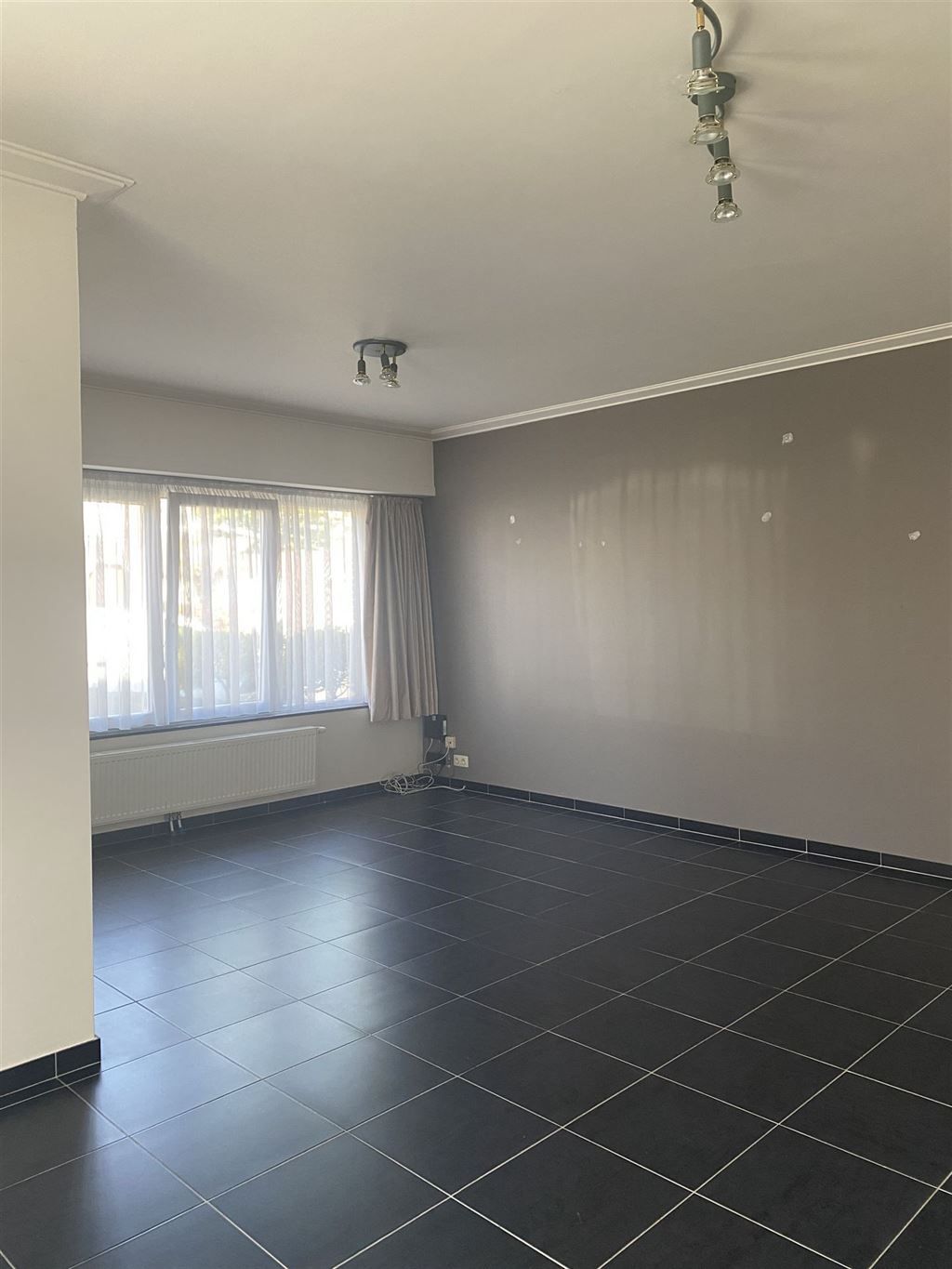 Gelijkvloers appartement in rustige straat foto 3