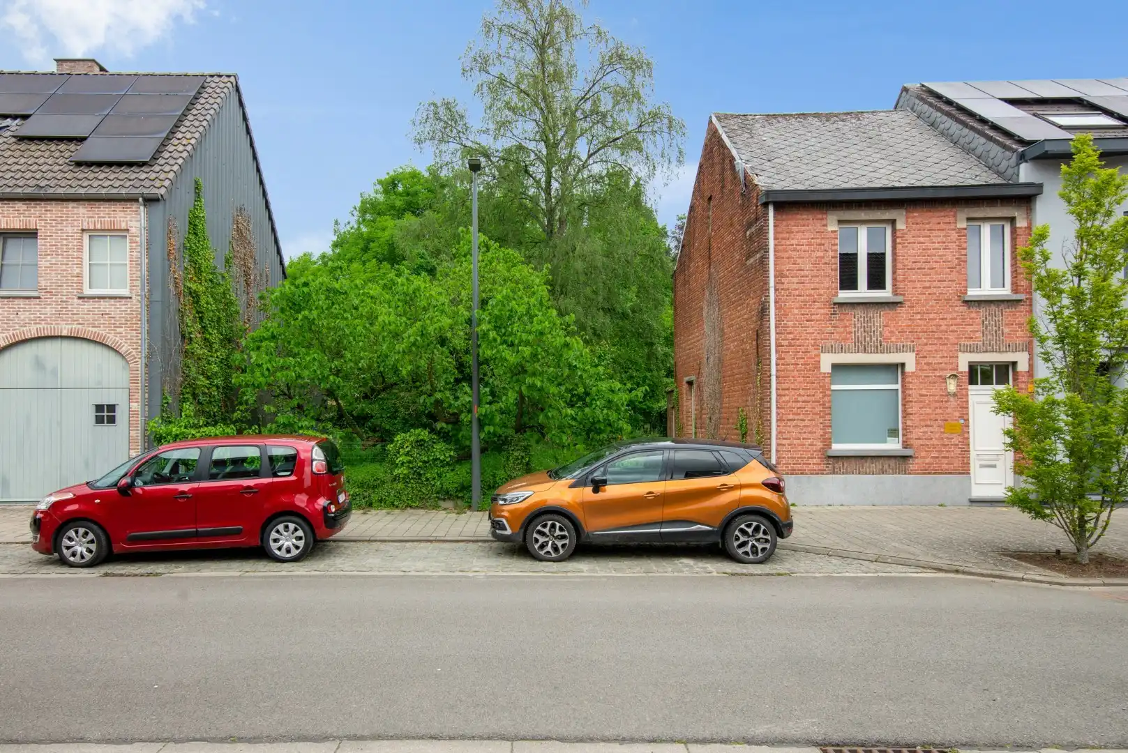 Te renoveren woning met bouwgrond en veel potentieel op rustige ligging in Puurs-Sint-Amands! foto 2