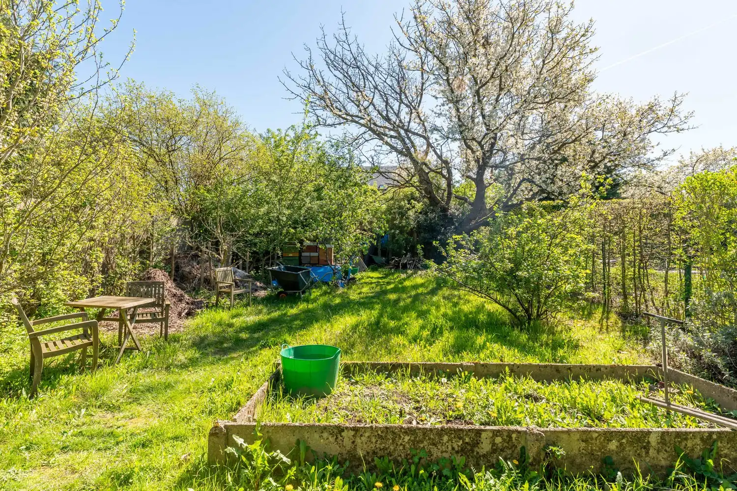 Goed gelegen en energiezuinige woning met 4 slaapkamers, een oprit met een garage en een tuin op de grens van Kessel-Lo en Holsbeek! foto 10