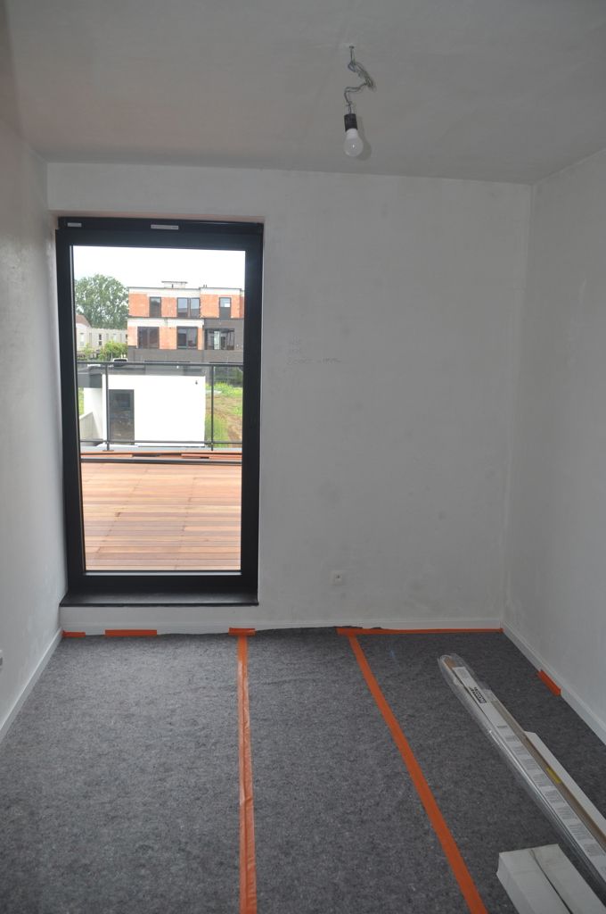 Nieuwbouw duplex-appartement te huur in Opwijk centrum! foto 7