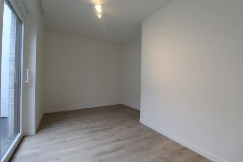 Gelijkvloers nieuwbouw appartement met zonnige tuin te Gent foto 5