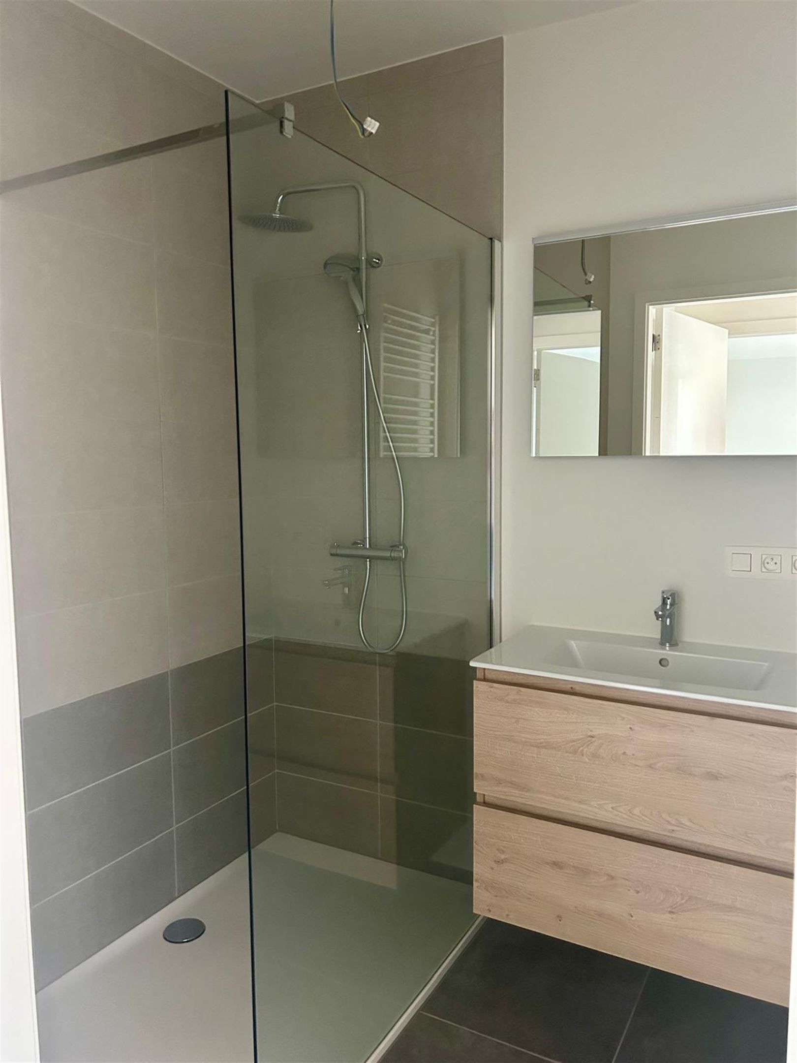 Nieuwbouwappartement met 1 slaapkamer en parkeerplaats foto 9