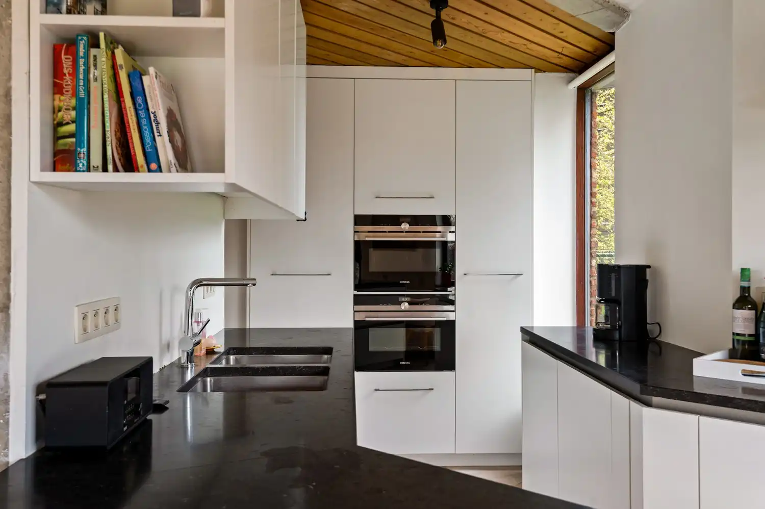 Open bebouwing met 4 slaapkamers, 2 badkamers en tuin in Borsbeek! foto 12