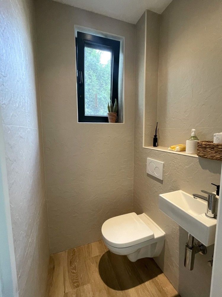 Instapklaar en polyvalent handelspand met 2 handelsruimten en ruim appartement foto 21
