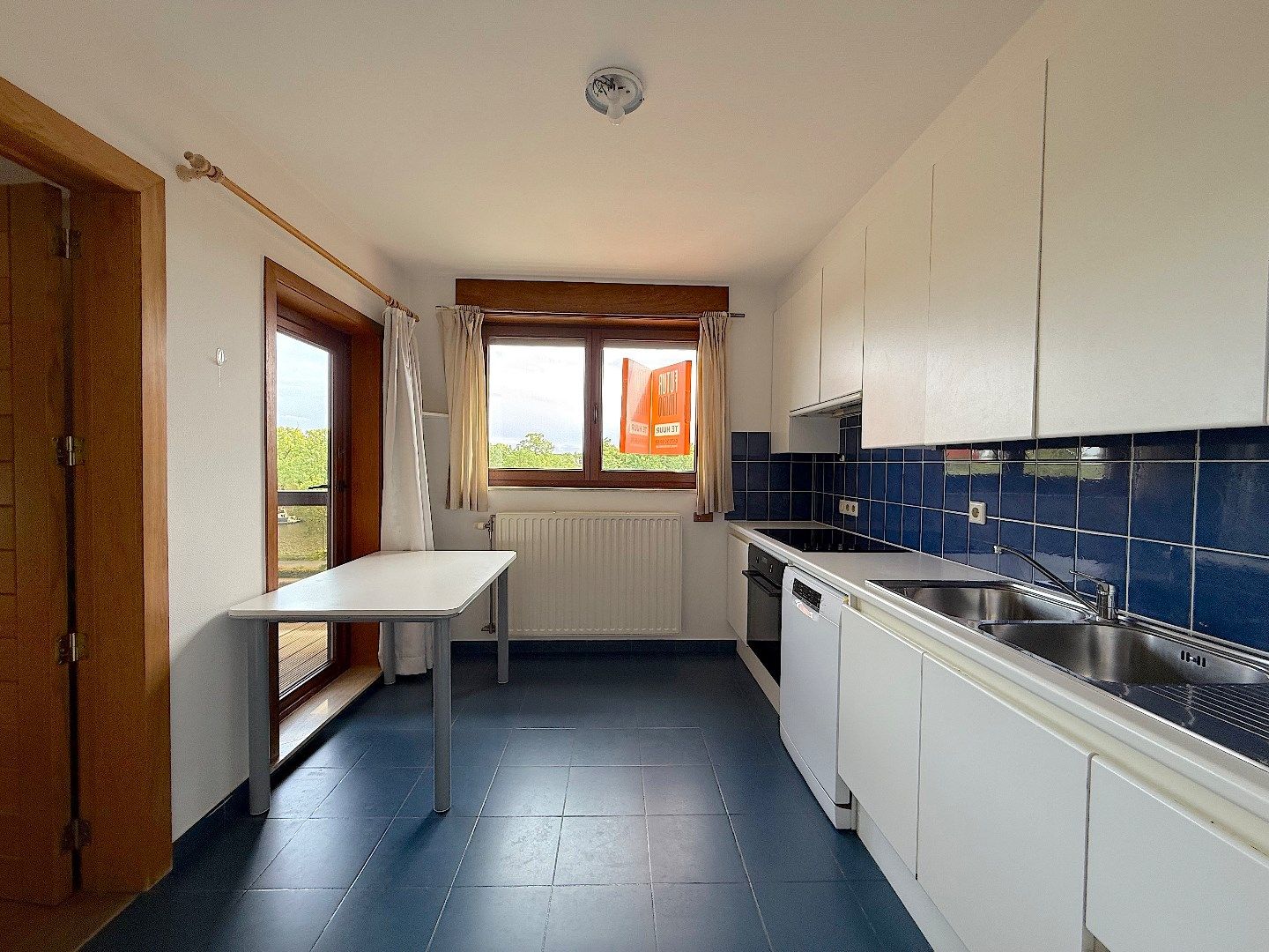 Ruim 3-slpk appartement met garage foto 8
