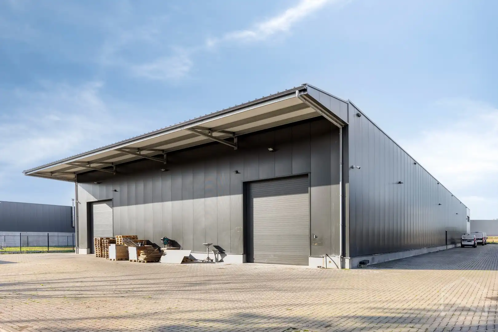 Magazijn met bureauruimte en parkeerplaatsen te huur in Tessenderlo-Ham foto 19