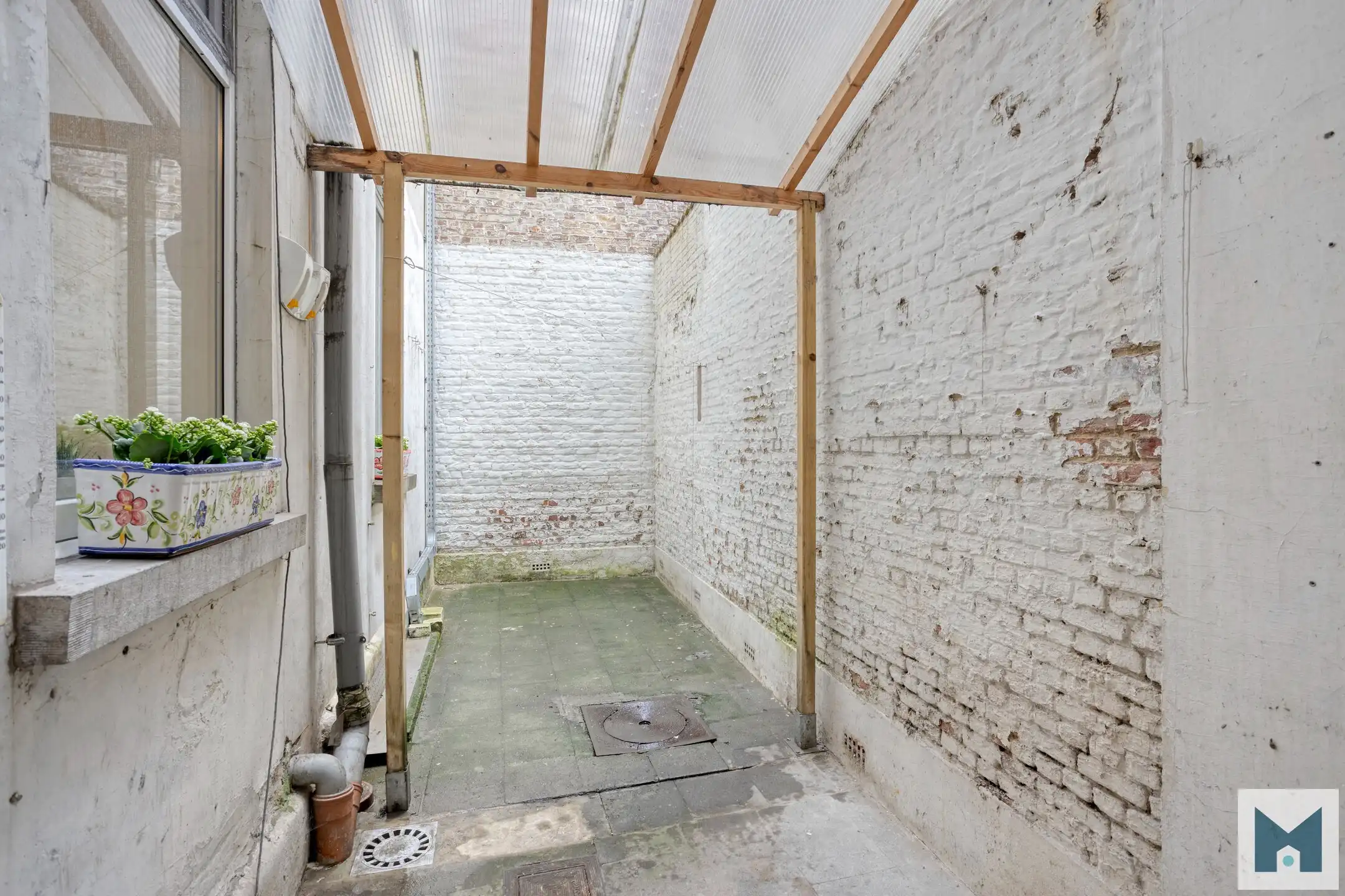 Ruim gelijkvloers appartement met 2 slpks en ruime atelier! foto 15