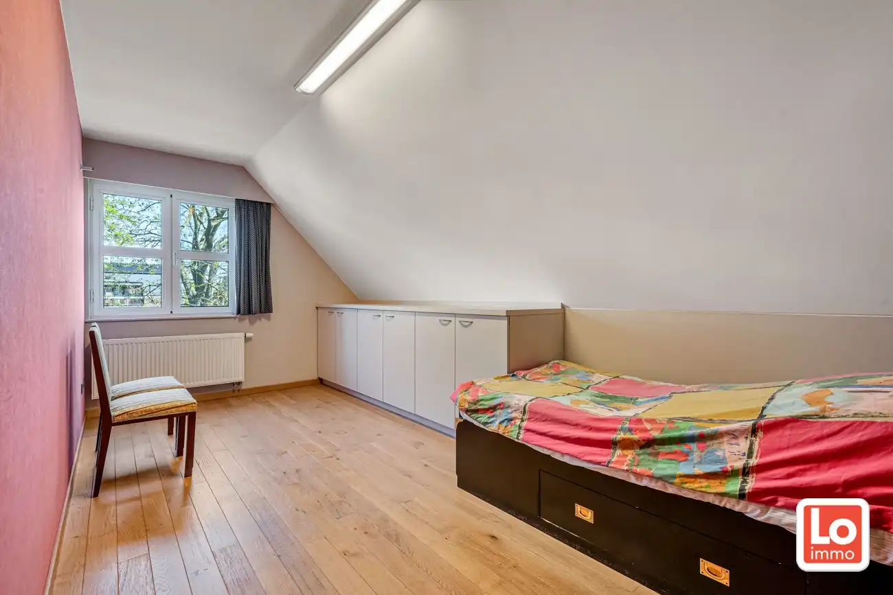 Instap klare open woning met ruime inpandige garage en gezellige tuin op een rustige locatie en toch nabij het centrum van Lochristi! foto 27