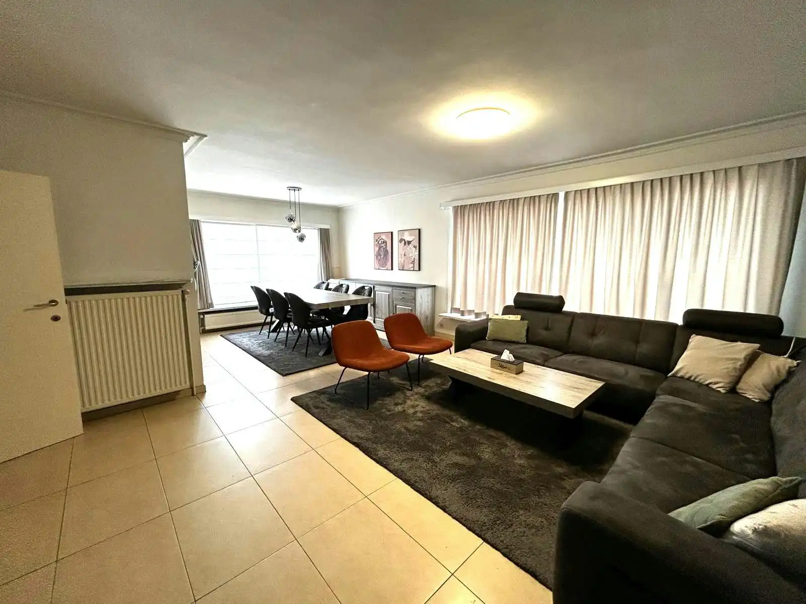 Building met twee verhuurde appartementen en 4 garages foto 7