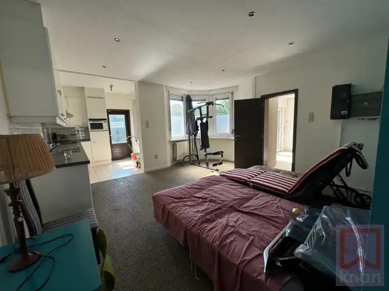 Ruime veelzijdige woning, inpandige garage en 4 slaapkamers op zuidgericht perceel! foto 4