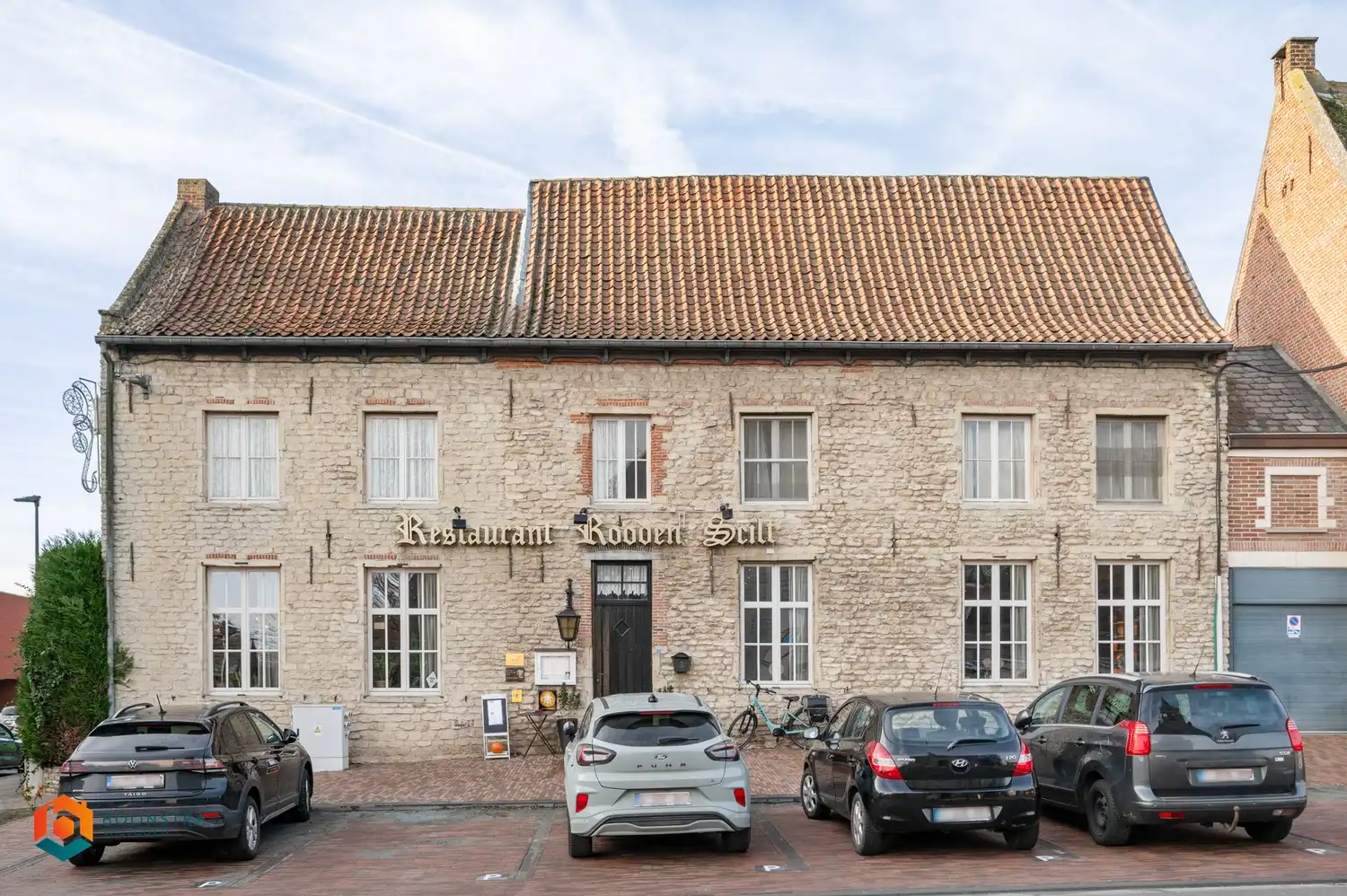Handelspand met bovengelegen woonst op toplocatie te Erps-Kwerps foto {{pictureIndex}}