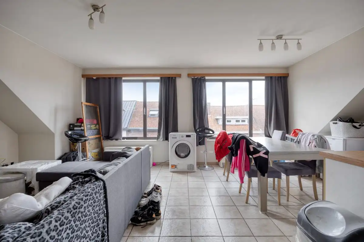 Opbrengsteigendom met 3 appartementen en 7 garages foto 15