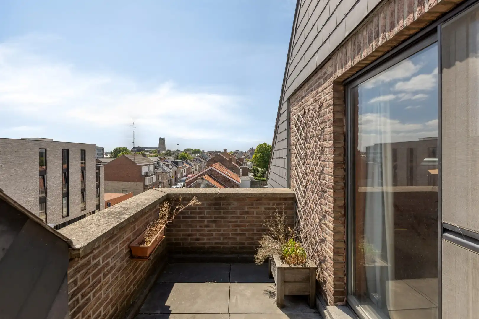 Gezellig en ruim appartement (124m²) met zonneterras en garage - wandelafstand centrum Tongeren foto 2