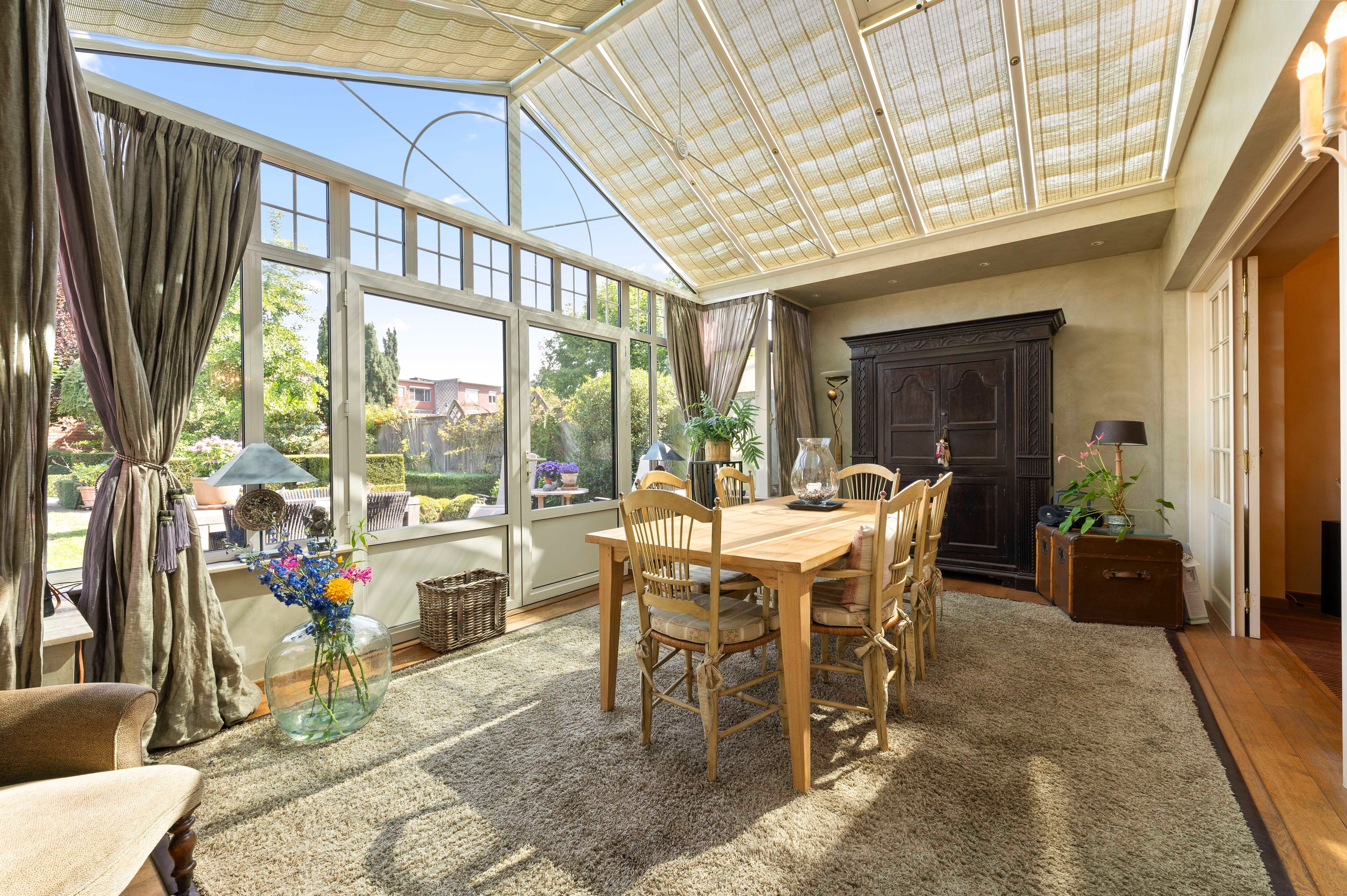 Instapklare gezinswoning met prachtige tuin en veranda in hartje Ekeren foto 16