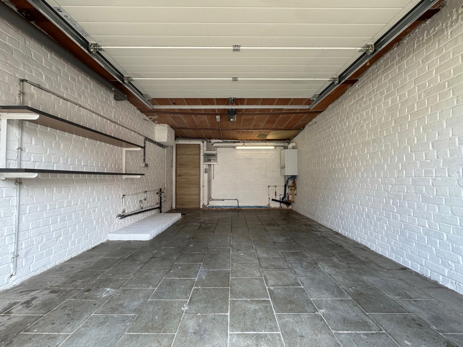 Rustig gelegen gelijkvloers-appartement met tuin foto 16