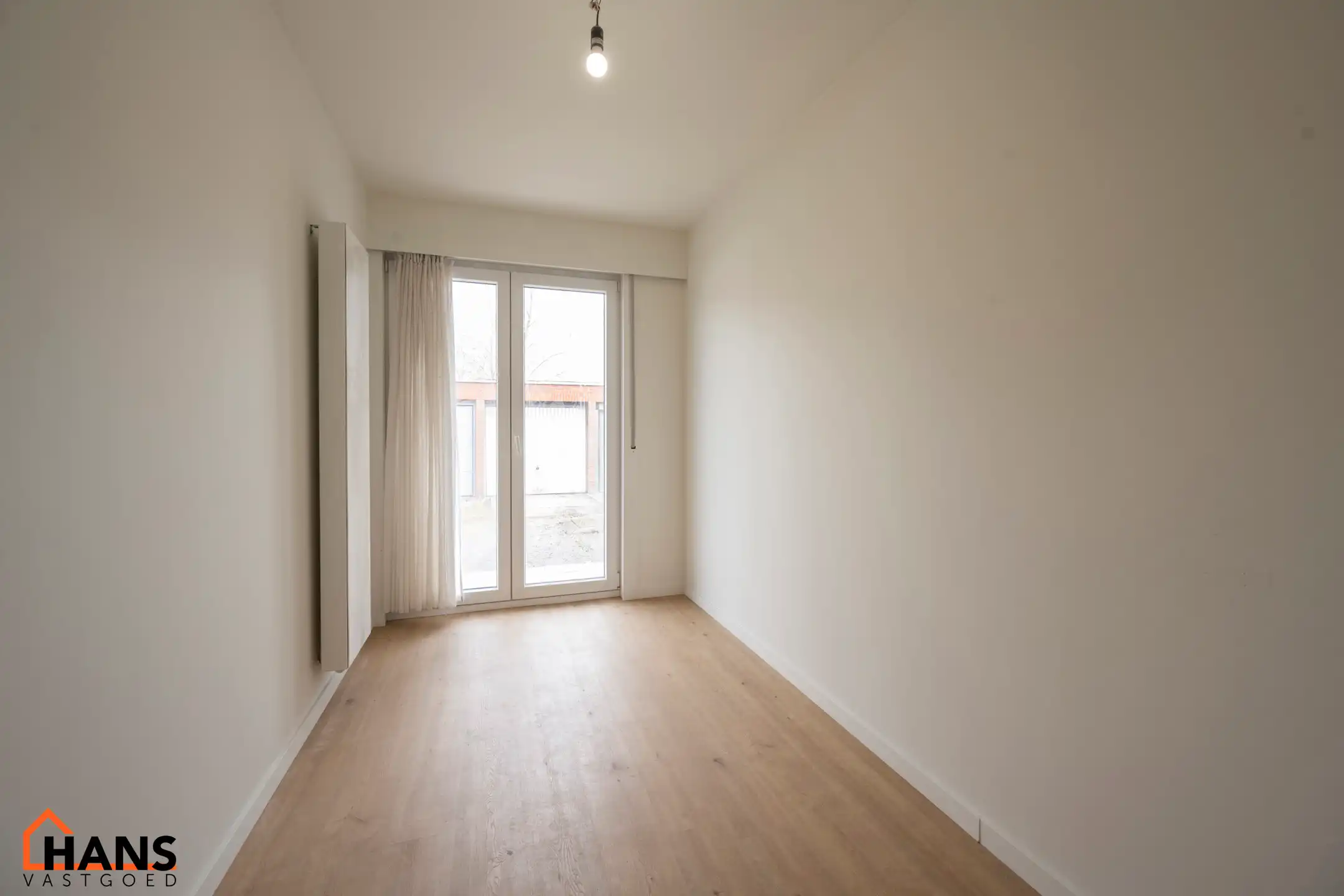 Gerenoveerd gelijkvloersappartement met garagebox. foto 9