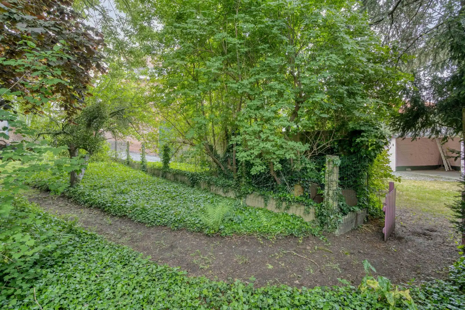Te renoveren woning met tuin en garage in het centrum van Menen! foto 22