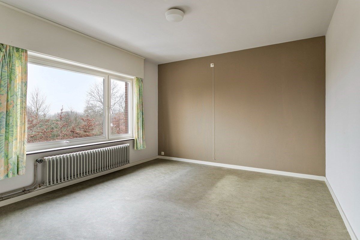 Ruime woning met 4 slaapkamers en garage! foto 15