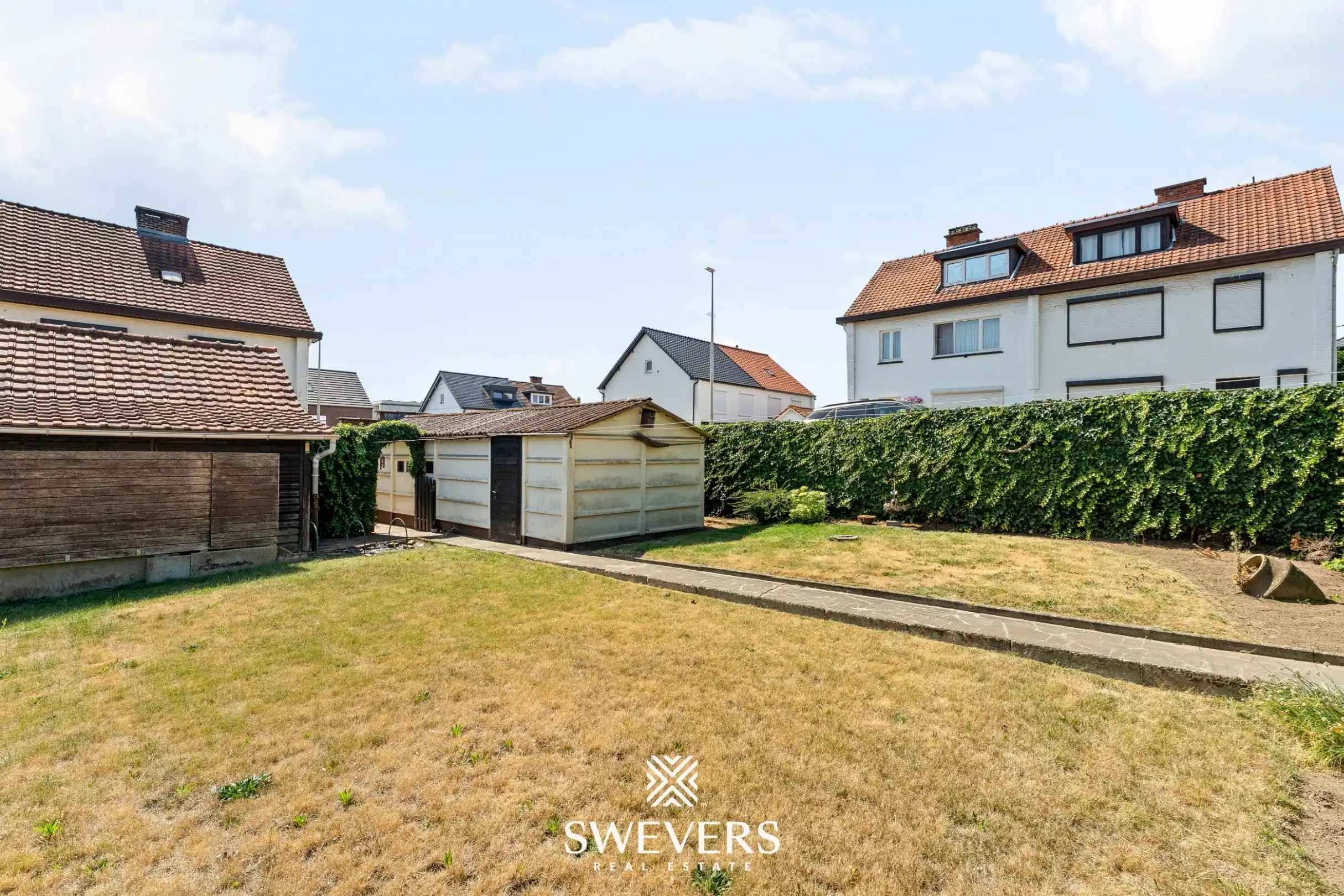 Uitstekend gelegen woning met 4 slaapkamers en mooie tuin foto 31
