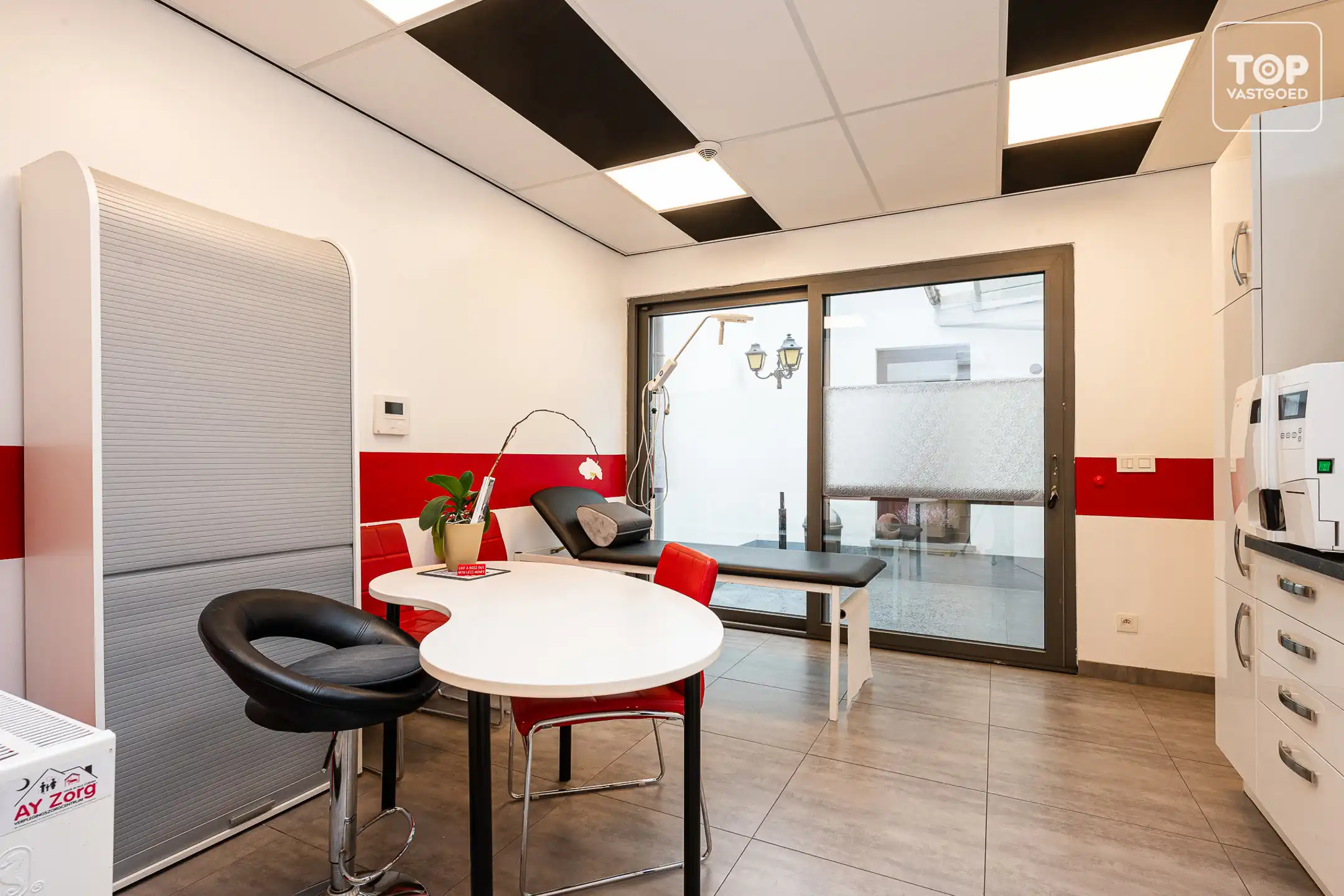 Opbrengsteigendom met polyvalente ruimte + 2slpk appartement foto 10