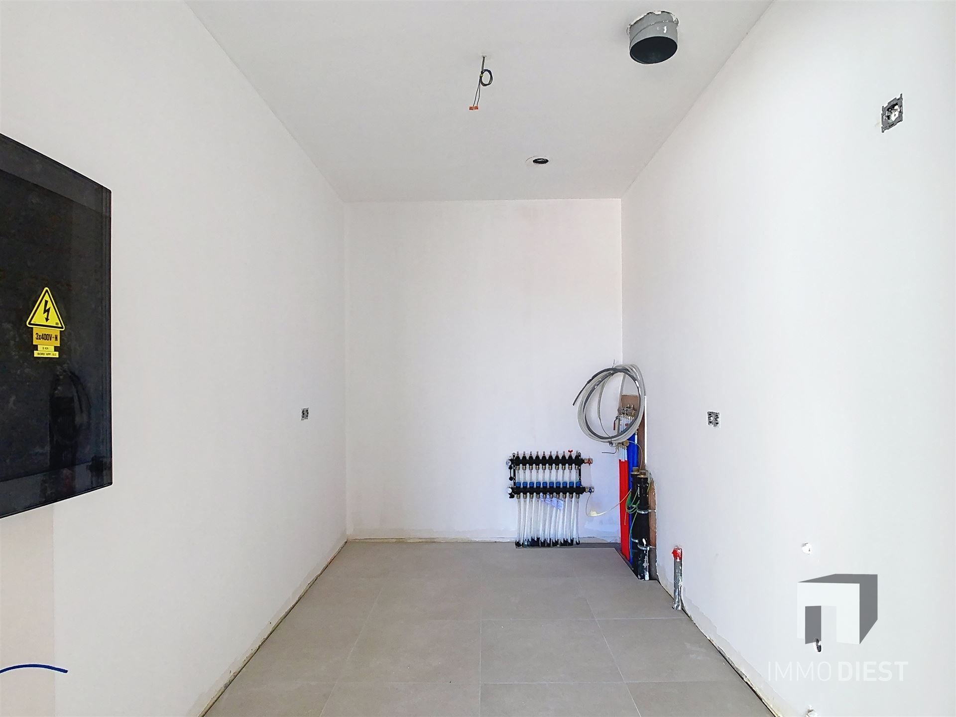 Gelijkvloers appartement met terras en tuintje foto 6